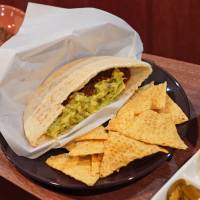 In the halal pocket: Om Nom Nom’s specialties are its 100 percent halal-chili sets, which come with toppings such as jalapenos or freshly made guacamole. Om Nom Nom