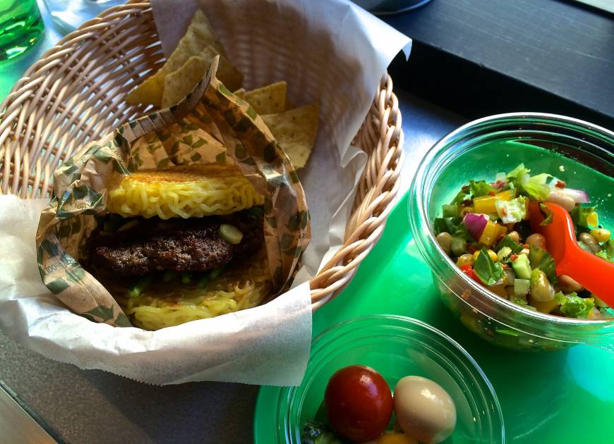 Ramen Burger Noodling in: A Ramen Burger set comes with the burger, a New York salad and chips, but the main draw is the ramen patties. | ROBBIE SWINNERTON