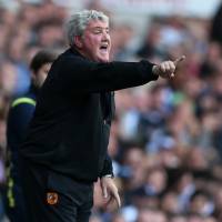 Trying times: Hull City manager Steve Bruce\'s team must defeat Manchester United on Sunday and hope Newcastle United falls to West Ham to guarantee that it won\'t be relegated from the Premier League. | REUTERS