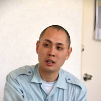 Helping hand: Education official Masatoshi Ishii speaks about his experiences at the Tama Juvenile Training School. | SATOKO KAWASAKI