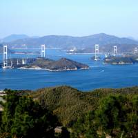 The view from Mount Chikami lookout in Imabari, Ehime Prefecture, reveals the length of Kurushima-Kaikyo Bridge, part of the Shimanami Kaido toll road and the longest suspension bridge in the world. Don't build castles in the air, go see Ehime Prefecture's real ones
