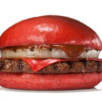 One of Burger King Japan\'s new burgers, Aka Samurai Beef, comes with red buns and red cheese mixed with tomato powder, a beef patty and onion. | BURGER KING JAPAN