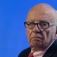Executive chairman of News Corporation Rupert Murdoch, seen here during a panel discussion at the B20 meeting of company CEOs in Sydney in July 2014., reportedly preparing to step down as chief executive of the media-entertainment conglomerate 21st Century Fox. | AFP-JIJI