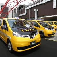 A ceremony to mark the debut of Nissan Motor Co.\'s wagon-type cabs, based on the NV200, is held at Tokyo Tower on Monday. | KAZUAKI NAGATA
