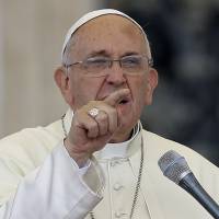 Pope Francis delivers his message on the occasion of an audience with participants of Rome\'s diocese convention in St. Peter\'s Square, at the Vatican, Sunday. Francis engaged in some self-promotion during his weekly blessing, alerting the thousands of people in St. Peter\'s Square that his first solo encyclical is coming out on Thursday and inviting them to pay attention to environmental degradation around them. | AP