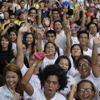 Filipinos march in Manila on Saturday to push for gay rights and to celebrate the U.S. Supreme Court decision recognizing gay marriages in all U.S. states. U.S. ruling on same-sex marriage likely to affect other countries