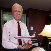 In this Jan. 10. 2011, file photo, Chesley \"Sully\" Sullenberger ,captain of the US Airways Flight 5149 that landed in New York\'s Hudson River in 2009, poses in his office at his home in Danville, California. Clint Eastwood will follow up his box-office sensation \"American Sniper\" with a biopic of Sullenberger. Warner Bros. announced Tuesday. | FILE / PAUL SAKUMA / AP