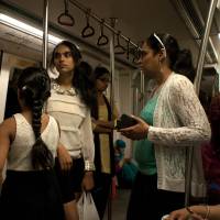 Indians ride a subway car reserved for women in New Delhi on June 10. | AFP-JIJI