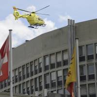 A helicopter takes off at the General Hospital in Geneva Sunday. Secretary of State John Kerry broke his leg in bike crash outside of Geneva on Sunday and called off the rest of a four-nation diplomatic trip. X-rays at the Swiss hospital confirmed a fracture of his right femur. Security measures were relieved after the departure of the helicopter but officials did not confirm that Kerry was on board. Kerry breaks hip, cuts Europe trip short just as Iran nuclear deal talks look set to heat up