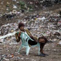 A Muslim man whose home was burned in 2013 during anti-Muslim violence is pictured in Meiktila in May. | REUTERS
