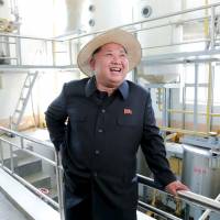 North Korean leader Kim Jong Un visits Farm No. 1116, under KPA (Korean People\'s Army) Unit 810, in this undated photo released by North Korea\'s Korean Central News Agency (KCNA) in Pyongyang on Monday. Outside his tightly controlled economy, his nation is seeing a rise in consumerism. | KNCA / REUTERS