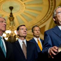 Senate Majority Leader Mitch McConnell, accompanied by (from left) Sen. Roger Wicker, Sen. John Barrasso and Sen. John Thune, speaks to the media during a news conference on Capitol Hill in Washington, Tuesday following a Senate policy luncheon as legislation to end the National Security Agency’s collection of Americans’ calling records while preserving other surveillance authorities, is expected to clear the Senate late Tuesday. But House leaders have warned their Senate counterparts not to proceed with planned changes to a House version. Congress submits tightened NSA phone-records bill for Obama's approval
