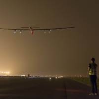 The Swiss-made Solar Impluse 2 solar-powered plane takes off from Lukou International Airport in Nanjing, China, early Sunday. | SOLAR IMPULSE / AFP-JIJI