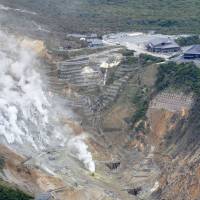 The aerial photo on June 5 shows the evacuation zone around the Owakudani hot-spring district at Mount Hakone in Kanagawa Prefecture. | KYODO