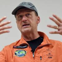 Solar Impulse 2 pilot Andre Borschberg speaks to journalists June 2 after he landed at Nagoya airport. | AFP-JIJI