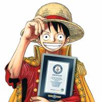 \"One Piece\" main character Monkey D. Luffy holds a Guinness World Records certificate. | COURTESY OF EIICHIRO ODA / SHUEISHA INC. / KYODO