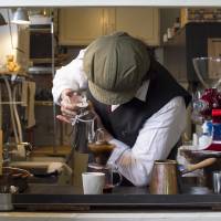 Pour soul: Shingo Naganuma carefully creates his signature drip coffee at Nejimakigumo. | JAMES HADFIELD