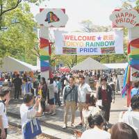 Park party: People gather at Yoyogi Park in Tokyo for a gay pride event. The park will host many festivals throughout the summer. | YOSHIAKI MIURA