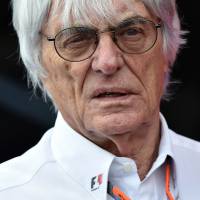 Formula One boss Bernie Ecclestone looks on at the paddock after qualifying for the Austrian GP on Saturday. Source: Dolphins owners, Qatar teaming up to buy Formula One stake