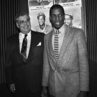 Former New York Mets co-owner Nelson Doubleday is seen with then-Mets pitching star Dwight Gooden in a file photo from Nov. 19, 1984, file photo. | AP