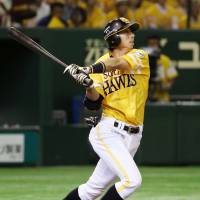 Fukuoka Softbank\'s Shuhei Fukuda hits a two-run shot in the second inning of the Hawks\' 3-1 win over the Lions on Monday. | KYODO