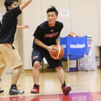 Yuki Togashi looks to take a shot during the first day of Japan\'s training camp for the FIBA Asia Championship on Monday. | KAZ NAGATSUKA