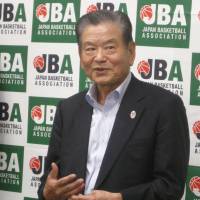 Japan 2024 Task Force co-chairman Saburo Kawabuchi speaks to the media on Friday night after confirming that FIBA has \"practically\" lifted its ban of the Japan Basketball Association. Kawabuchi made his remarks at the JFA House in Tokyo. | KAZ NAGATSUKA