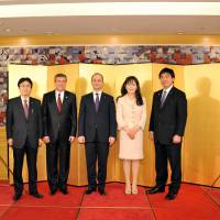 The minister of foreign affairs of the Republic of Albania, Ditmir Bushati (center), poses with (from left) Diet Member Kazuyuki Hamada, Albanian Ambassador Bujar Dida, Honorary Consul of Albania in Japan Kyoko Spector, and Diet Member and Chairman of the Japan-Albania Parliamentary Friendship Association Hiroshi Hase at a welcome reception for Bushati at the Hotel Okura in Tokyo on April 6. | ALBANIAN EMBASSY