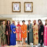 The Society of Wives of Arab Ambassadors and Heads of Missions in Japan (SWAAJ), including Qatar’s Jamila Al-Suwaidi (third from left), president of SWAAJ), Kuwait’s Jamilah Al-Otaibi (fourth from left) and other SWAAJ members, host a luncheon in honor of Princess Takamado (center) at the Kuwait embassy in Tokyo on May 14. | MIKI OSHITA