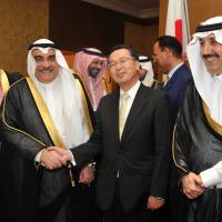 Saudi Minister of Economy and Planning H.E. Eng. Adel Fakih (second from left) shakes hands with Japan’s Ministry of Economy, Trade and Industry Vice-Minister for International Affairs Norihiko Ishiguro (second from right) alongside Governor of the Saudi Arabia General Investment Authority H.E. Eng. Abdullatif Al-Othman (left) and Saudi Deputy Minister of Foreign Affairs for Information and Technology Affairs H.H. Prince Mohammed bin Saud bin Khalid, (right) at a Saudi Arabia-Japan Forum dinner, celebrating the 60th anniversary of Saudi-Japanese diplomatic relations at The Ritz-Carlton Tokyo on May 18. | YOSHIAKI MIURA