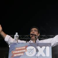 Greek Prime Minister Alexis Tsipras speaks at a rally organized by supporters of the \"no\" vote in Athens on Friday. | AP