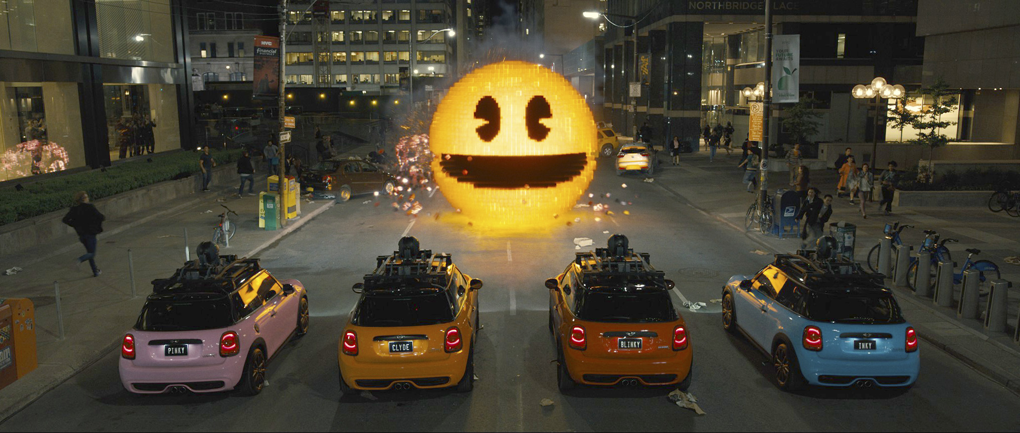 Inky, Blinky, Clyde and Pinky are seen in Columbia Pictures' 'Pixels.' The movie opened in U.S. theaters on Friday. Sony Pictures Entertainment is accused of sanitizing the film to get it past Chinese censors. | AP