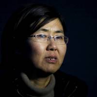 Human rights lawyer Wang Yu talks during an interview in Beijing in March last year. | REUTERS