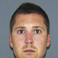 This booking photograph released Wednesday by the Hamilton County Sheriff\'s Office shows University of Cincinnati police Officer Ray Tensing, who turned himself in Wednesday afternoon to face murder and manslaughter charges in the traffic stop shooting death of motorist Samuel DuBose in Cincinnati earlier this month. | HAMILTON COUNTY SHERIFF\'S OFFICE VIA AP