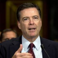 FBI Director James Comey testifies Wednesday during the Senate Judiciary Committee hearing on Capitol Hill. The FBI stopped several potential acts of violence in the month before the July 4 weekend, Comey said on Thursday. | AP