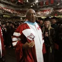 In this May 12, 2011, file photo, comedian Bill Cosby, a Temple University alumnus and trustee, appears at a commencement ceremony in Philadelphia. Cosby admitted in a 2005 deposition that he obtained Quaaludes with the intent of using them to have sex with young women. In court documents released Monday he admitted giving the sedative to at least one woman. | AP