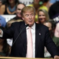 Republican presidential candidate Donald Trump speaks at a rally and picnic Saturday in Oskaloosa, Iowa. | AP