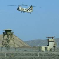 An Iranian military helicopter flies over the Natanz nuclear facility in this 2005 file photo. | AFP-JIJI