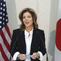 U.S. ambassador to Japan Caroline Kennedy makes remarks upon her arrival at the Narita International Airport in November 2013. | BLOOMBERG
