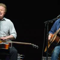 In this Jan. 15, 2014, file photo, Don Henley (left) and Glenn Frey of The Eagles perform at the Forum in Los Angeles. | JOHN SHEARER /I NVISION/AP