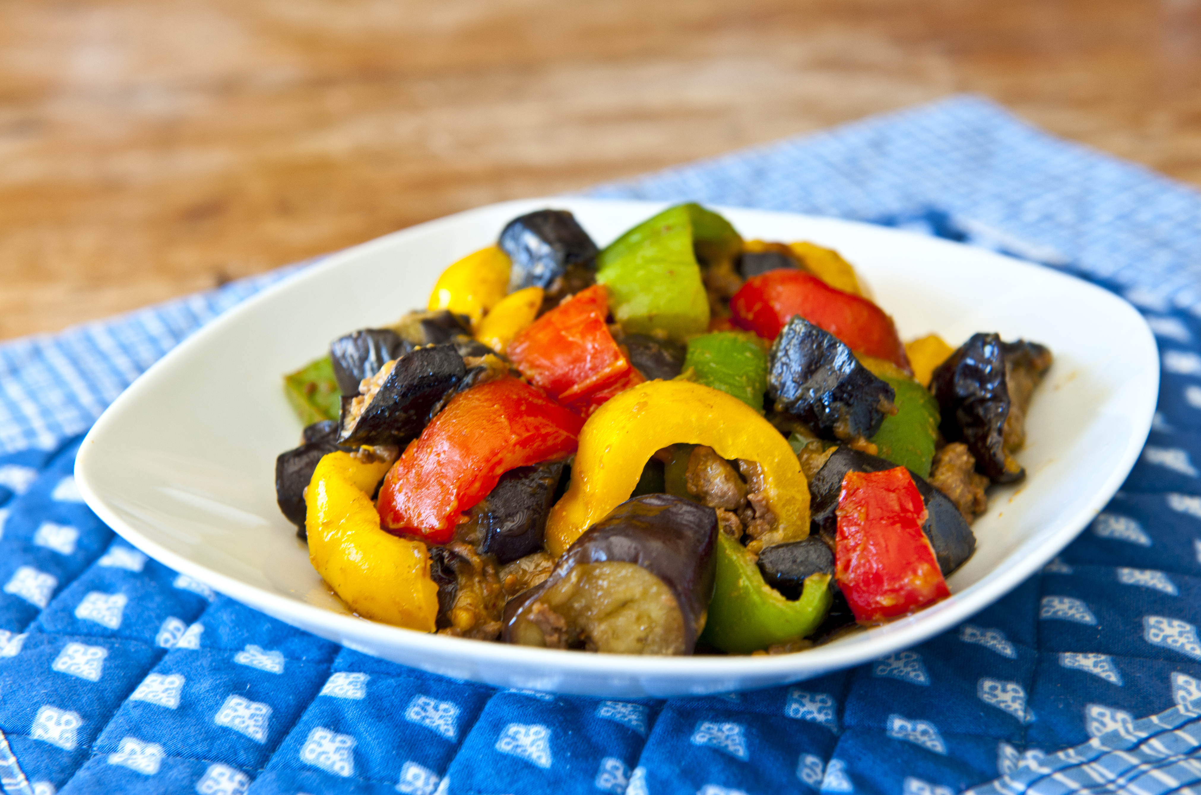 Loved and hated: Adding peppers to an eggplant stir fry is a good way to sneak the vegetable past those who don't like its bitterness | MAKIKO ITOH