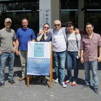 Sell-out tour: \"The Cove\" authors Ric O\'Barry (third from right) and Hans Roth (second from left) visit Shanghai University to give a public presentation about \"The Cove.\" | SASHA ABDOLMAJID