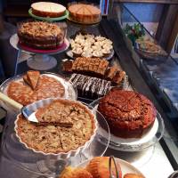 Taking the cake: The counter at Mornington Crescent is filled with traditional British desserts. Britain's food revolution hits Tokyo