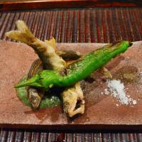 Grilled and fried: A deep-fried ayu (sweetfish) served with a rich green sauce and grilled shishito green pepper. | J.J. O\'DONOGHUE
