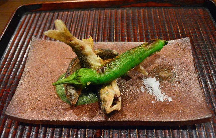 Ogawa Grilled and fried: A deep-fried ayu (sweetfish) served with a rich green sauce and grilled shishito green pepper. | J.J. O'DONOGHUE