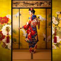 An opulent furisode kimono typically worn for Coming of Age day in Japan. Underneath the 'Orientalist' kimono