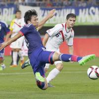 Wataru Endo attempts to kick the ball during U-22 Japan’s 2-0 win over Costa Rica on Wednesday. | KYODO