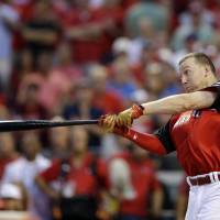 Cincinnati Reds slugger Todd Frazier connects during the Home Run Derby on Monday night at the Great American Ball Park. Frazier won the contest held the day before Tuesday’s All-Star Game. Frazier wins Home Run Derby