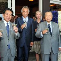 French Ambassador Thierry Dana (right) and his wife Florence Godfernaux (third from right) prepare for a toast with (from left) former Vice President of the House of Councilors Akiko Santo, Education, Culture, Sports, Science and Technology Minister Hakubun Shimomura, Vahid Halilhodzic, head coach of the Japanese national soccer team, and former Prime Minister Yoshiro Mori, during a reception celebrating the country\'s National Day at the ambassador\'s residence in Tokyo on July 14. | YOSHIAKI MIURA