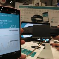 A prototype for an automatic waistline measuring device is displayed at Maker Faire Tokyo 2015, held on Saturday and Sunday at Tokyo Big Sight in the capital\'s Odaiba district. | KAZUAKI NAGATA